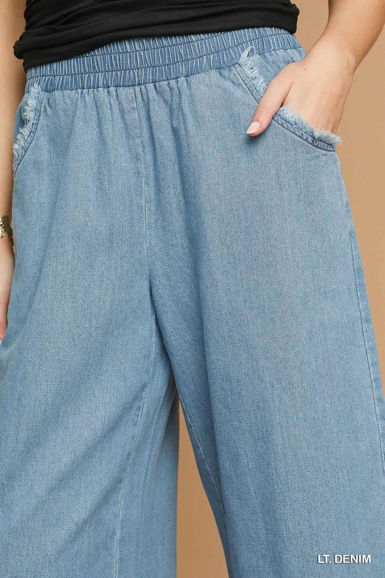 Washed Denim Pants with Fringe Hem